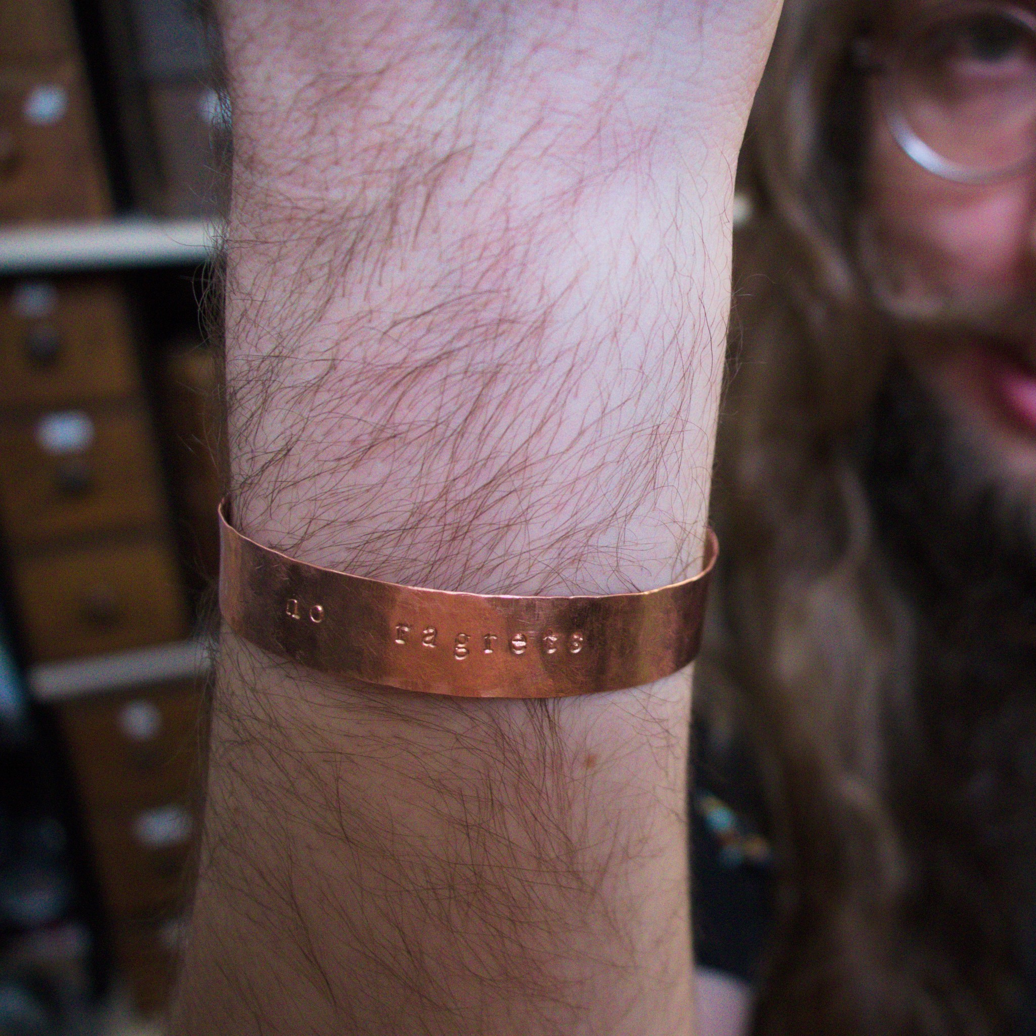 no ragrets – custom stamped copper bracelet – in use – close up face background (3)-2 (RR)