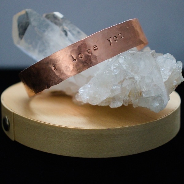 I Love You – Custom Stamped Copper Bracelet – Staged on Quartz